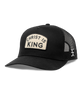 Black cap with 'Christ is King' patch on a white background